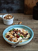 Vegan almond yoghurt with grapes and nuts