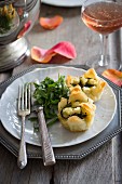 Cheese and rocket puff pastry tartlets