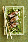 Steamed pork roulade with ginger and dried plums