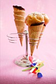 Peach sorbet with fresh ginger in ice cream cones