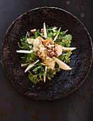 An autumnal salad with pears and walnuts