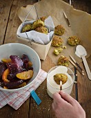 Oven-baked falafel with a yoghurt and tahini dip and a beetroot salad