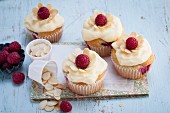 Raspberry and almond cupcakes with a vanilla yoghurt topping