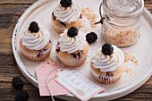 Blackberry and coconut cupcakes with soya cream frosting