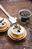 Hearty pumpkin and beer cupcakes with bacon and cream frosting