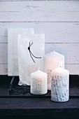 Pillar candles stamped with messages