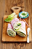 Wraps with cheese, lettuce, cucumber and turkey ham