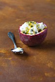 Turkish yoghurt with passion fruit served in a passion fruit shell
