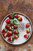 Fresh strawberries on a silver tray