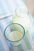 Soured milk in a glass and in a bottle