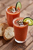 Gazpacho with sunflower seeds and cucumber slices