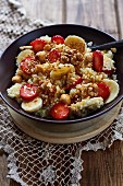 Millet with banana, strawberries and apple syrup