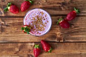 A strawberry smoothies with kefir and sesame seeds