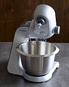 A food processor with a mixing bowl and dough hooks