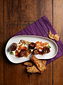 Sweet-and-sour aubergines with unleavened bread