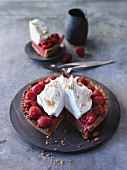 Raspberry tart topped with meringue