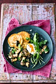 Fried wild mushrooms with quark cakes and poached egg