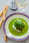 Fish fillet in pea sauce with spinach