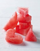 Chunks of frozen watermelon cut into different shapes