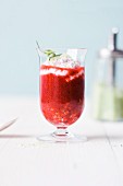 Strawberry and tarragon gazpacho with mascarpone and long pepper foam in a glass