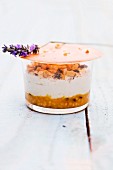 Goat's cheese mousse with lavender and melon tartare and a pine nut cracker