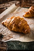 Croissants on baking paper