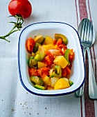 Gluten-free pasta salad with potatoes, tomatoes and pepper