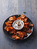 Oven-roasted sweet potato crisps with a walnut dip