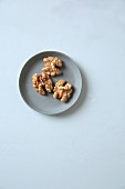 A dish of walnut seeds