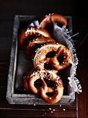 Salted pretzels in a wooden crate
