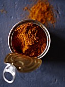 A spice mixture in a tin can