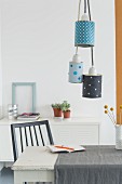 Homemade pendant lamps made from tin cans