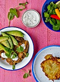 Beef with mint sauce, avocado and potato cakes