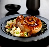 Cumberland sausage with spring onion mashed potatoes and onion gravy