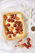 Camembert cake with eggs and tomatoes