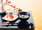 Prawn sushi and soup with mochi skewers, Japan
