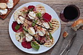 Beetroot carpaccio with grilled fruit, goat's cheese and maple syrup