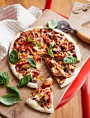 Smoky barbecued chicken pizzas