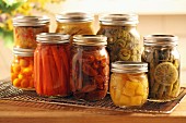 Pickled fruit and vegetables in screw-top jars