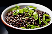 Black lentil salad with spring onions