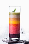 A colourful layered smoothie