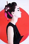 A young woman styled like a geisha