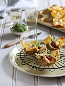 Lasagne tartlets with a Bolognese filling, béchamel sauce and herbs