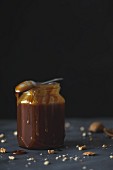 A jar of dark caramel sauce