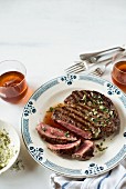 Grilled beef steak with herb butter