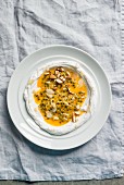 Coconut yoghurt with passionfruit sauce