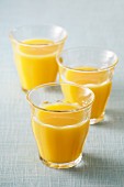 Three glasses of orange juice
