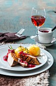 Duck breast with redcurrant chutney and potato dumplings