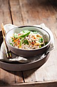 Rice noodles with chicken, vegetables and herbs (Asia)