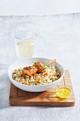 Salmon skewers on spicy rice